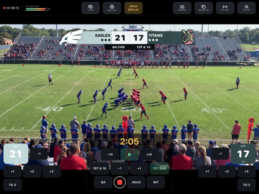 Football game with The Gridiron scoreboard, showing down and distance.