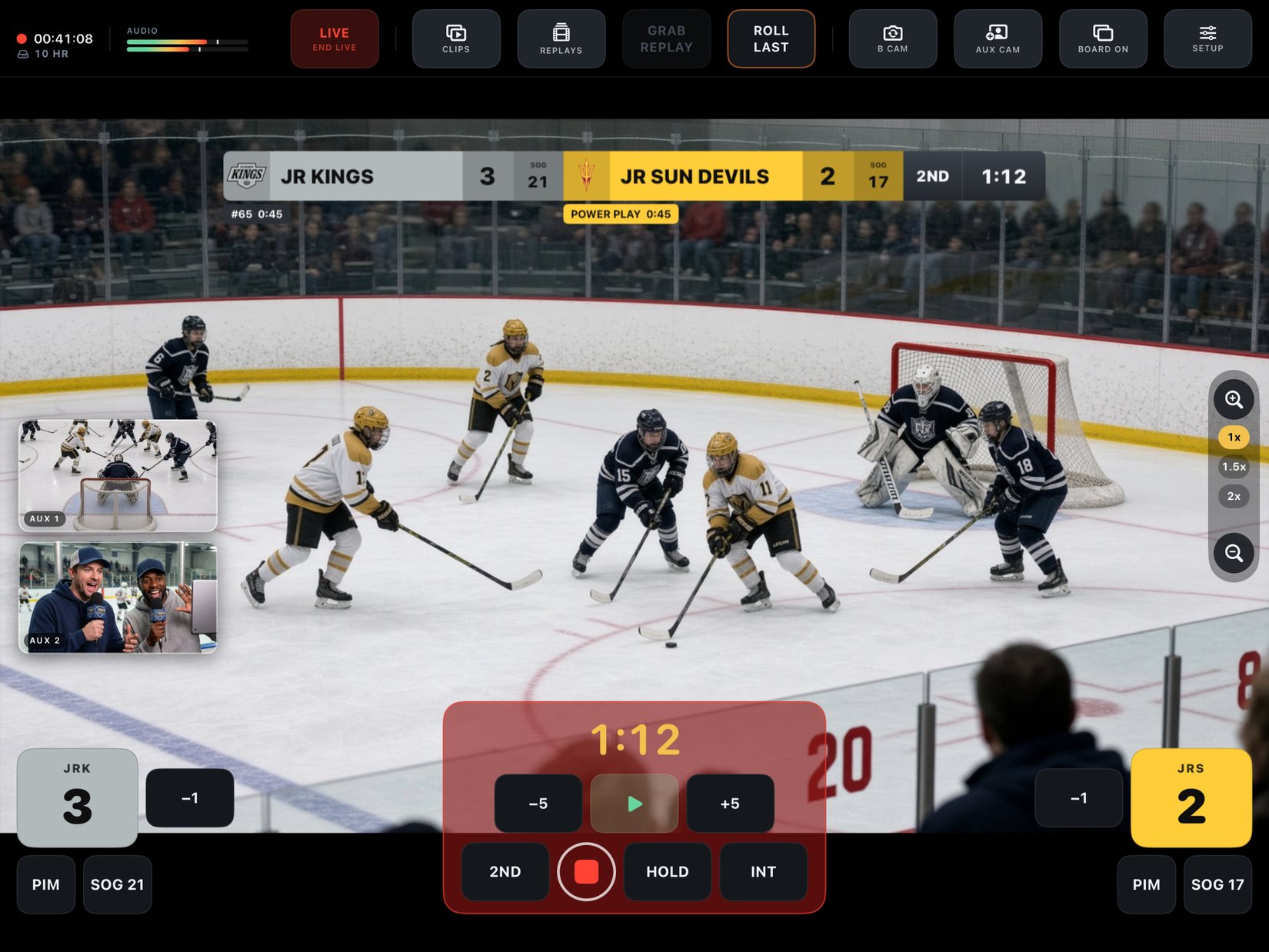 Dad Sports Network running on iPad: a youth hockey game live, the scoreboard burned into the picture with a power play on the clock, and two aux camera feeds — a behind-the-net angle and two parents calling the game on DSN microphones.